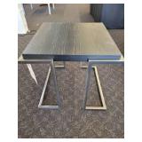 A Wood Grain Top with chrome legs Side Table.
