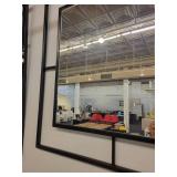 Black Iron Framed Wall Mirror with a Windowpane Design.