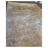 A  9" x 13" Silk Area Rug.