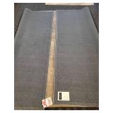 A  9" x 13" Silk Area Rug.