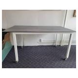 A Counter Height Table with a Ceramic Top by Johnston Casuals.