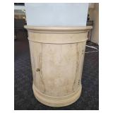 A Henredon Burl Drum Table.