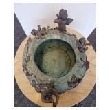 An Art Nouveau Style Patinated Bronze Jardiniere with Cherubs Playing Musical Instruments.