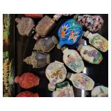 A lot of 27 Snuff Bottles. 8 bottles are missing their stops. Cinnabar. Painted. Etc.