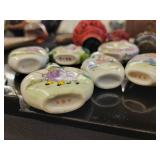 A lot of 27 Snuff Bottles. 8 bottles are missing their stops. Cinnabar. Painted. Etc.