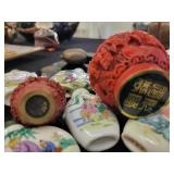 A lot of 27 Snuff Bottles. 8 bottles are missing their stops. Cinnabar. Painted. Etc.