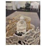 A Bone Carved Buddha Statue with Stand.