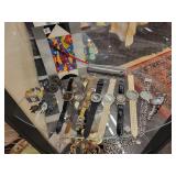 A Leather Display Case with all the jewelry contents shown.