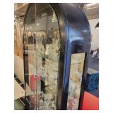 A Black Curved Top Display Case with all contents included.