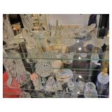 A Black Curved Top Display Case with all contents included.