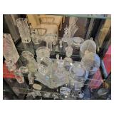 A Black Curved Top Display Case with all contents included.