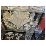 A Black Curved Top Display Case with all contents included.