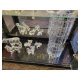 A Black Curved Top Display Case with all contents included.