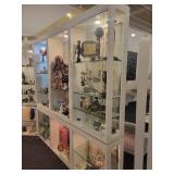 A large L Shaped Display case by Ello. Case only.  Contents not included.