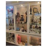 A large L Shaped Display case by Ello. Case only.  Contents not included.