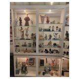 A large L Shaped Display case by Ello. Case only.  Contents not included.