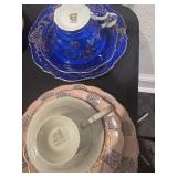 A set of 9 China Cups & Saucers, some with underplates.