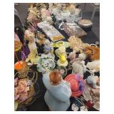 A table full of Porcelain Shoes, Figurines, Music and plain Boxes, Collectibles etc.