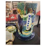 A table full of Figurines, Dolls, Glassware, Leaded Glass Sconce Cover, China, Perfumes etc.