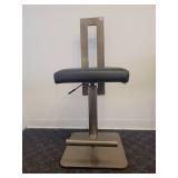 A single, very Modern Swivel Bar Stool.