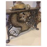 A group lot of items. Rams Head Urn, A Floor Candlestick, Decorative Metal Stand & Abstract Wood Figure.