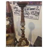 A group lot of items. Rams Head Urn, A Floor Candlestick, Decorative Metal Stand & Abstract Wood Figure.
