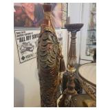 A group lot of items. Rams Head Urn, A Floor Candlestick, Decorative Metal Stand & Abstract Wood Figure.