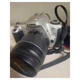 2 Cameras: Canon Rebel 2000 EOS & Canon EX Auto with lenses.