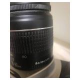 2 Cameras: Canon Rebel 2000 EOS & Canon EX Auto with lenses.