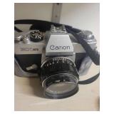 2 Cameras: Canon Rebel 2000 EOS & Canon EX Auto with lenses.