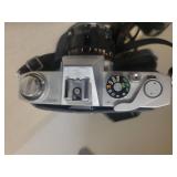 2 Cameras: Canon Rebel 2000 EOS & Canon EX Auto with lenses.