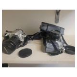2 Cameras: Canon Rebel 2000 EOS & Canon EX Auto with lenses.