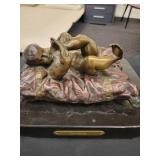A Bronze Statue: Baby On A Pillow by Chiparrus. 10" x 9" x 6" tall.