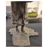 A Bronze Statue of of Ebenezer Scrooge: Candle Holder.