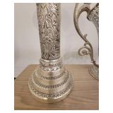 A Silver Raised Design Plant Stand with an angel and flowers, and a handled Vase / Bowl.