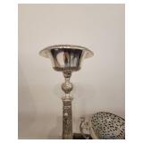 A Silver Raised Design Plant Stand with an angel and flowers, and a handled Vase / Bowl.