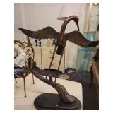 A group of items for sale: Large Brass Crane Bird, Cast Iron Dog, Decorative Box etc.