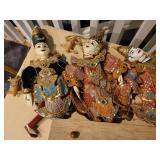 A collection of Asian themed  Items: Puppets, Photo Albums and Decor items.