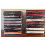 LR - Collection of Assorted Music CDs Including Josh Groban, Mamma Mia, Santana, and More