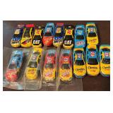 Lot of 15 Branded Diecast Race Car Toys Including Cheerios, CAT, Pop Secret, and More