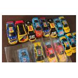 Lot of 15 Branded Diecast Race Car Toys Including Cheerios, CAT, Pop Secret, and More