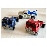 Set of 3 Vintage Hot Wheels Red Line Diecast Trucks Ramblin Wrecker and American Tipper Blue and Red