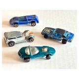 Set of 4 Vintage Redline Hot Wheels Cars Including Silhouette, Custom Camaro, Prowler, and Buzz Off