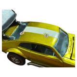 Vintage Hot Wheels Redlines Mighty Maverick Diecast Car in Metallic Yellow