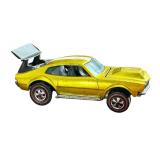 Vintage Hot Wheels Redlines Mighty Maverick Diecast Car in Metallic Yellow