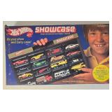 LR - Hot Wheels Showcase Set with 48-Car Carrying Case, Good Year Tire Case, Multiple Cars and Giftpack