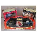 LR - Hot Wheels Collector Corvette Showcase and 1957 Chevy 40th Anniversary Sets in Original Packaging