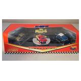LR - Hot Wheels Collector Corvette Showcase and 1957 Chevy 40th Anniversary Sets in Original Packaging