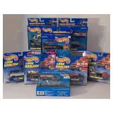 LR - Collection of 8 Hot Wheels Long Haulers and Racing Hauler Packs