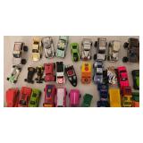DR - Collection of Mini Die-Cast Cars, Trucks, and Planes in Storage Tin